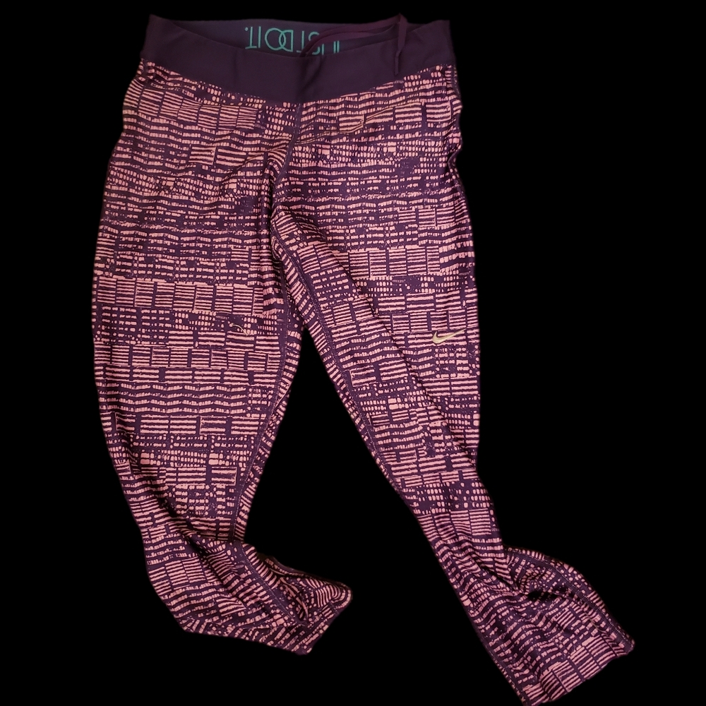 NIKE Women's DRI-FIT Capri Leggings Sz Med Purple/Pink pattern